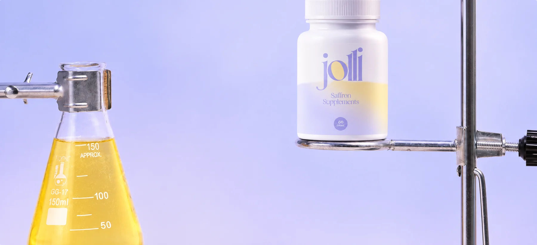 Jolli Saffron beside laboratory glassware on lavender